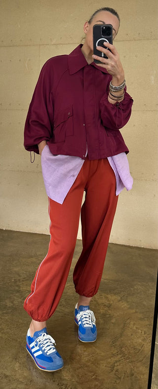 The Drift Track Pant - Paprika with Lilac Piping